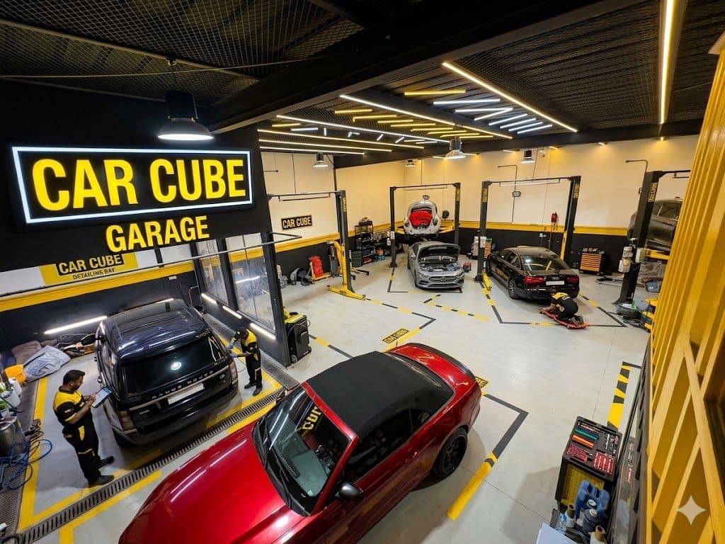 car service in dubai professional mechanic working on vehicle in garage